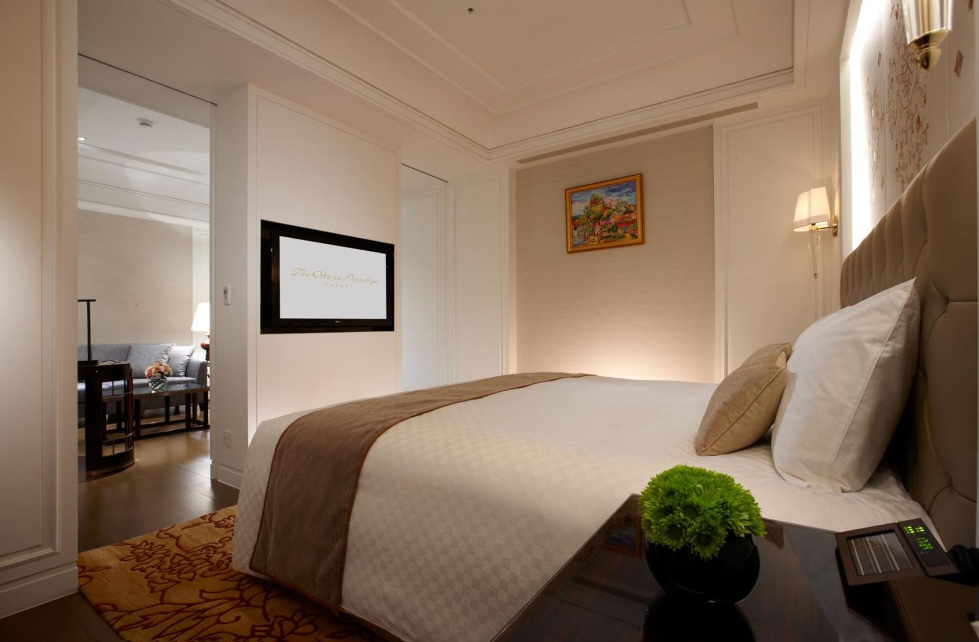 The Okura Prestige Taipei Hotell Eksteriør bilde A bedroom at the hotel