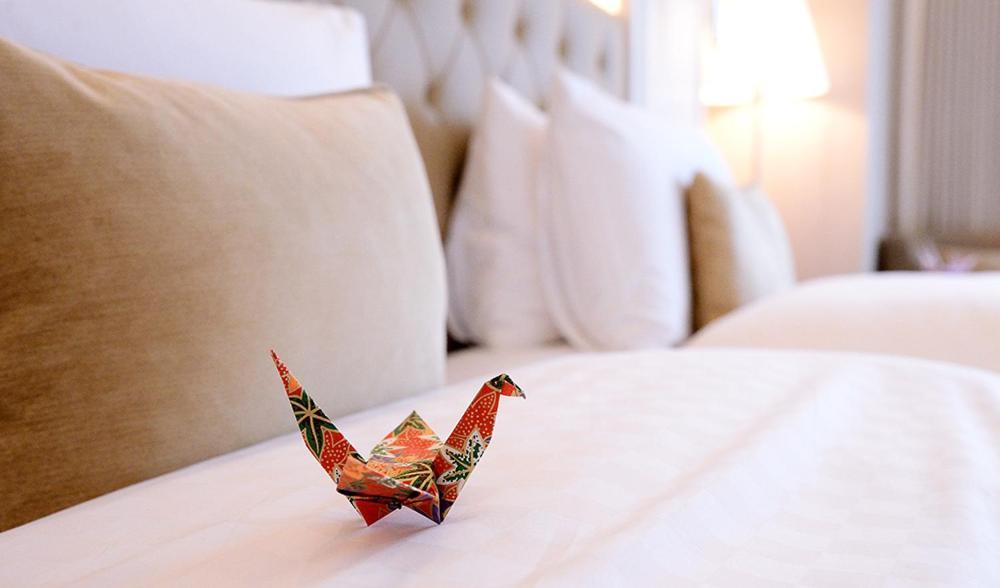 The Okura Prestige Taipei Hotell Eksteriør bilde A paper crane